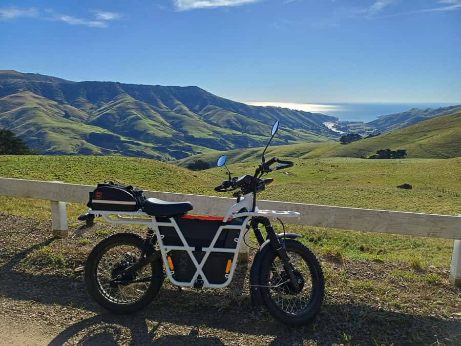 Akaroa: Lonely Beach Trail by E-Scooter. selfguided day out - From Akaroa pickup to your first scooter lesson