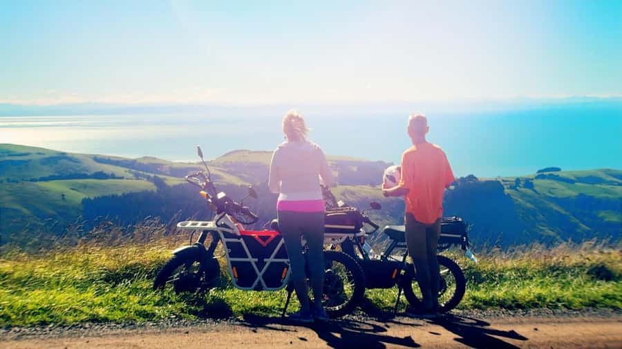 Akaroa: Lonely Beach Trail by E-Scooter. selfguided day out - Rolling roads lead to three beaches