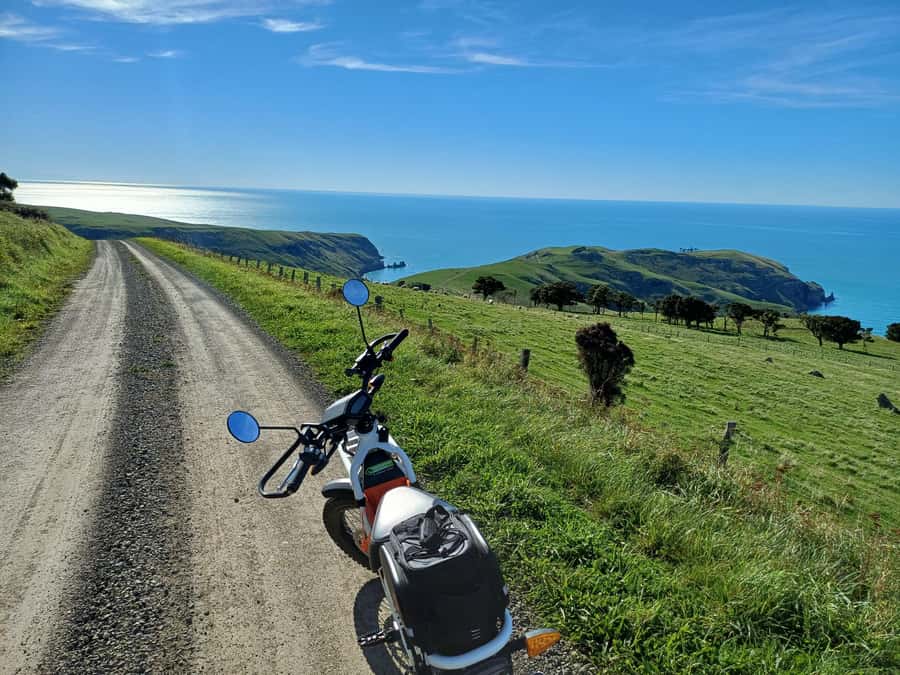 Akaroa: Lonely Beach Trail by E-Scooter. selfguided day out - Okains Bay combines a museum and a useful food stop