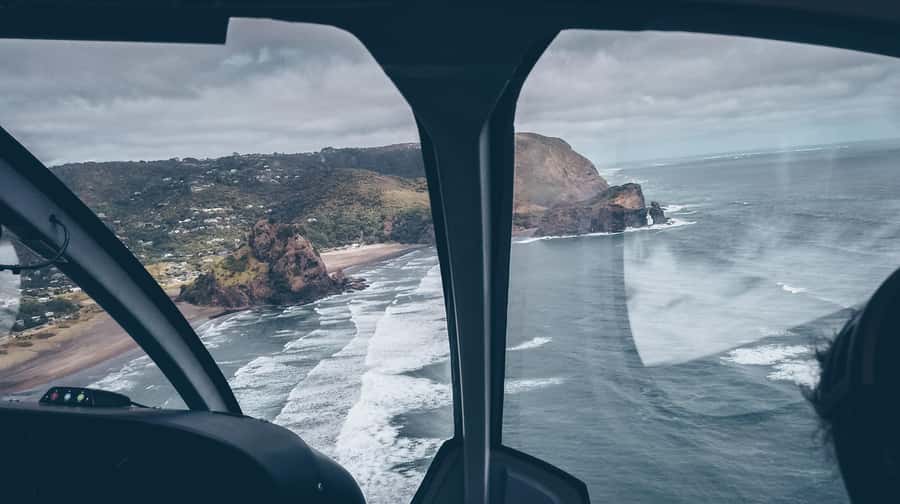 Auckland: 36 min scenic helicopter flight - Coast to Coast - Auckland from above: Sky Tower and Viaduct Harbour