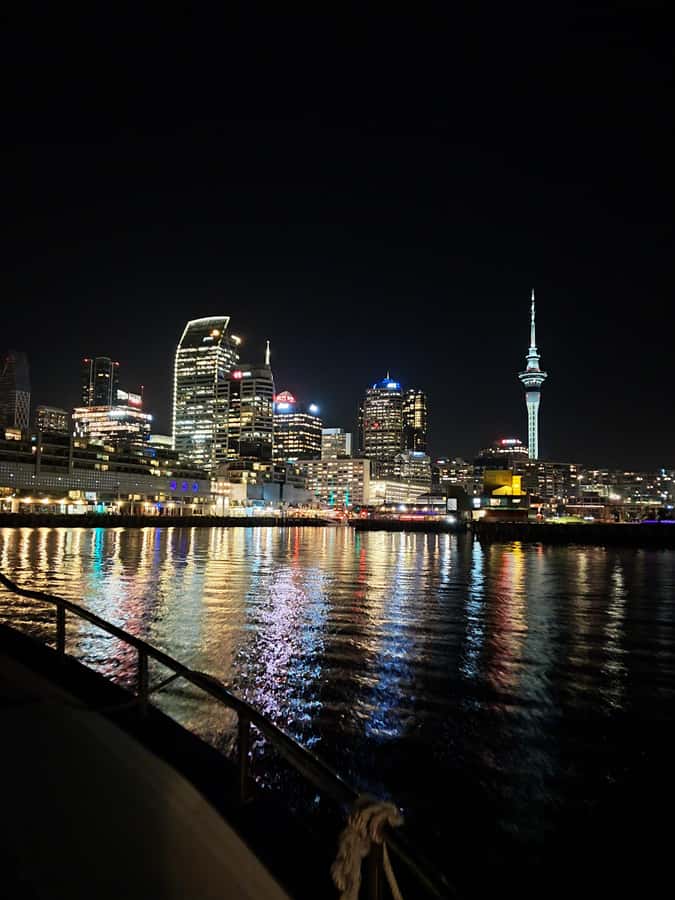 Auckland: Nightlights Harbour Cruise with Canapés and Drink - Sailing beneath the Harbour Bridge