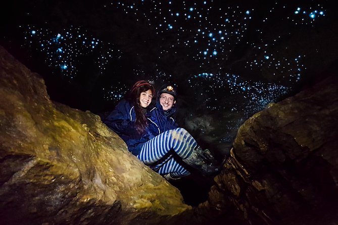Black Water Rafting Experience Waitomo Caves Tour - Inside Ruakuri Cave: water, rock, and glowworms