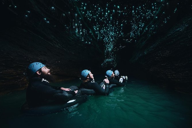 Black Water Rafting Experience Waitomo Caves Tour - Getting suited up for cold cave water
