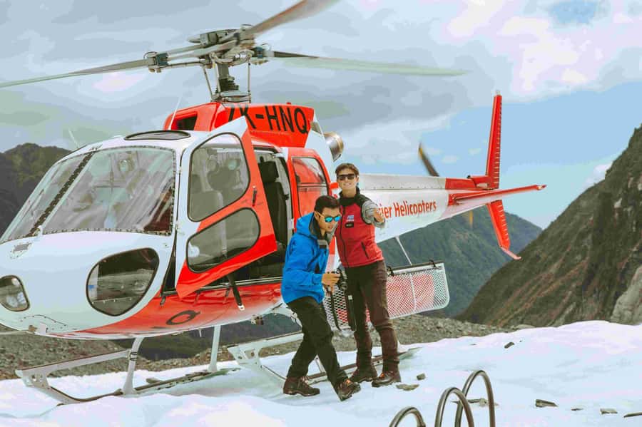 Fox Glacier: Up to 3 Hours Hike with Helicopter Transfer - Ice caves, arches, and the glaciers moving story