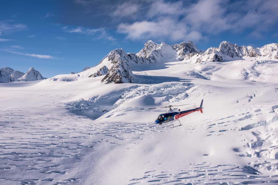 Franz Josef, Fox Glacier & Mt Cook Helicopter Scenic Flight - Stepping onto ancient snow