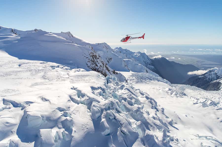 Franz Josef Glacier Helicopter Flight with Snow Landing - Stepping onto the snowfield