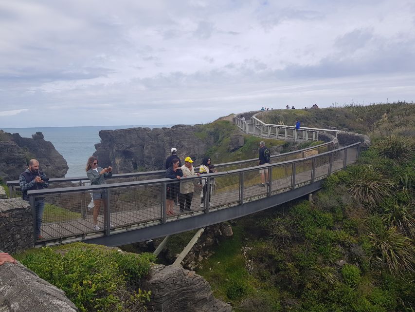 From Greymouth: Punakaiki Blowholes & Pancake Rocks Tour - The Truman Track and its sandy bay