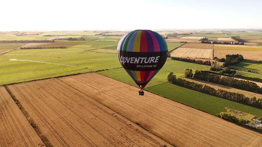 From Methven: Hot Air Balloon Flight in Canterbury with Wine - Landing in a paddock and helping pack away