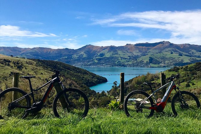 Guided Electric Mountain Bike & Sea Kayak Tour in Akaroa - Weather and cancellation matter here