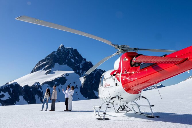 Half-Day Milford Helicopter Flight and Cruise from Queenstown - Booking, cancellation, and weather advice