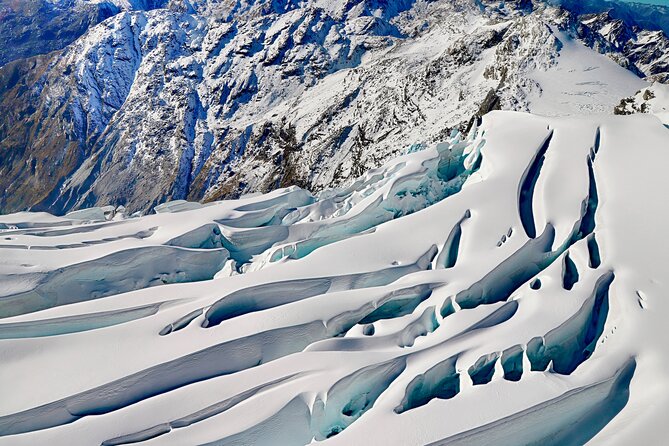 Hokitika Fly SIX Glaciers Heli Tour - The snow landing on Mt Beaumont