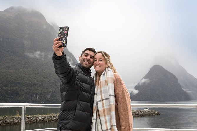 Milford Sound Day Tour from Queenstown - Arriving at Milford Sound and boarding the catamaran