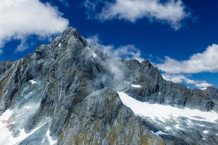 Milford Sound: Glacier and Waterfall Helicopter Experience - The return over forest, lakes, and waterfalls