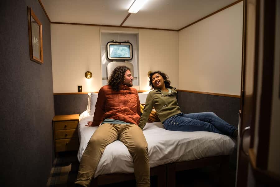 Milford Sound: Overnight Cruise with Water Activities - Waterfalls, cliffs, and wildlife from the deck