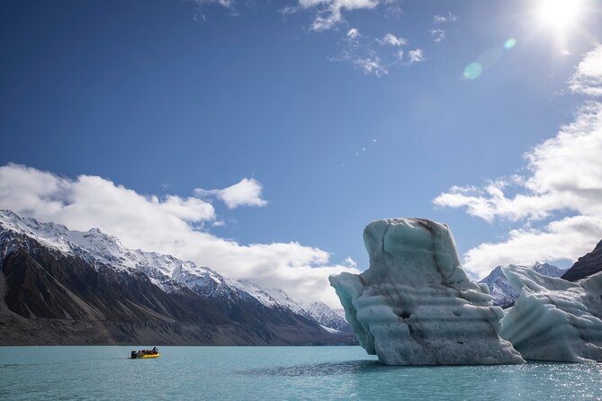 Mount Cook, Lake Tekapo and Tasman Glacier Tour from Christchurch - Lake Pukaki, the blue road toward Mount Cook