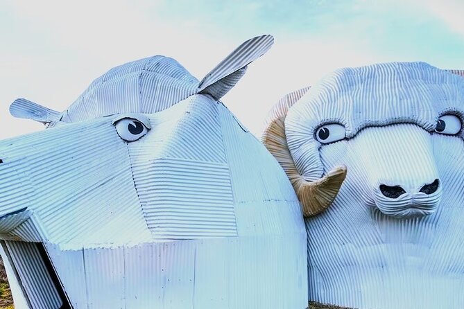 Mud Spa & Nature: Auckland to HELL's GATE, Rotorua & Blue Springs - Tirau’s sheep, dogs, and corrugated-iron humor