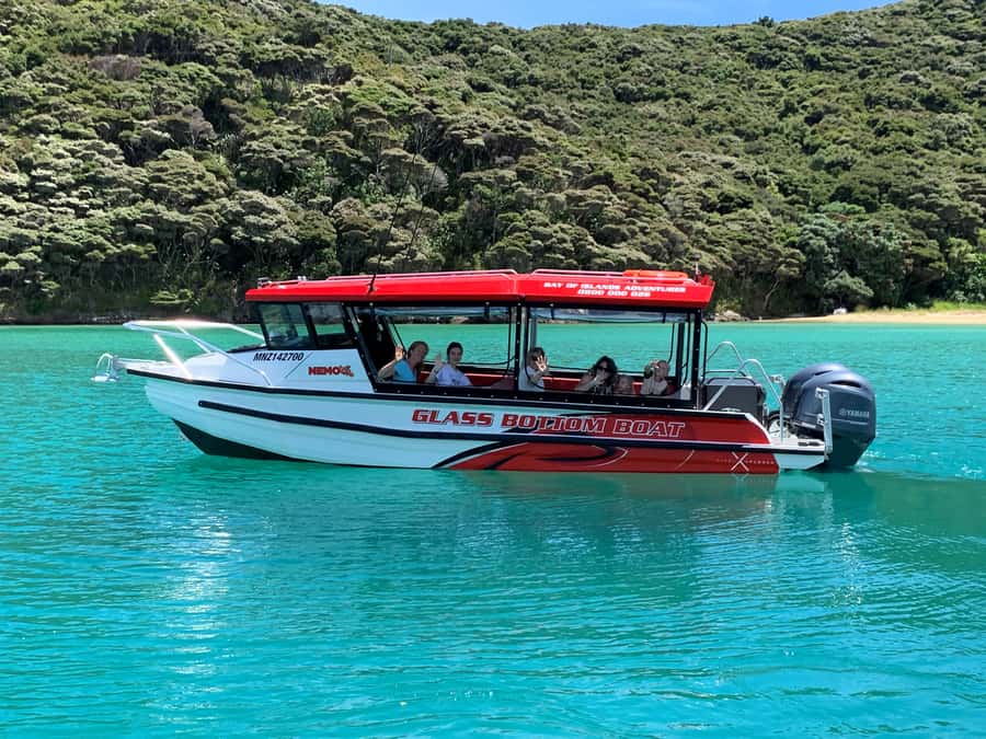 Paihia: Glass Bottom Boat Tour to the Hole in the Rock - The Okahu Passage and open-water ride