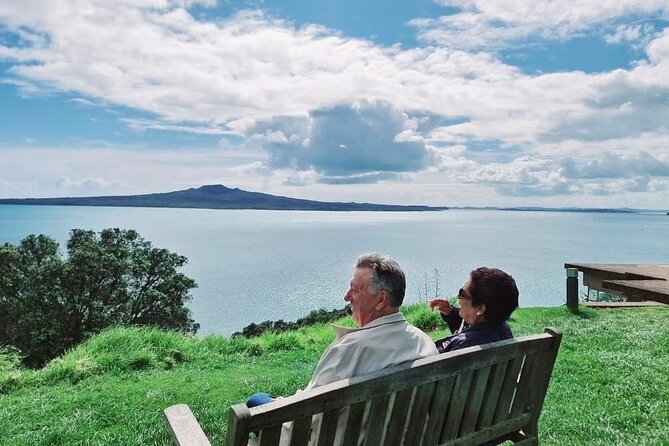 Private Auckland Highlight Day Tour - A private vehicle, guide, water, and a tour video