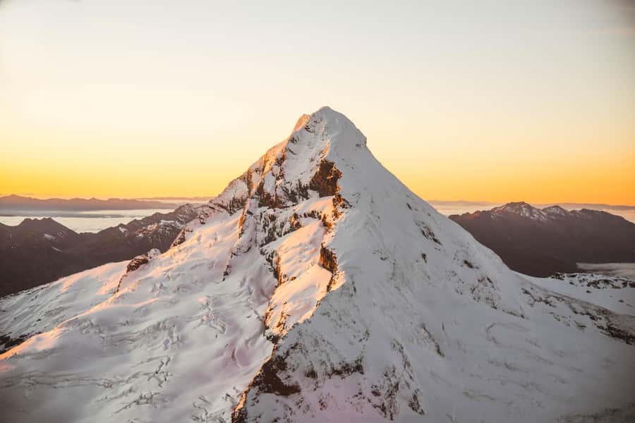 Queenstown: Sunrise Glacier Scenic Flight - Watching the sun appear behind Mt. Aspiring