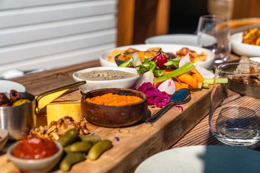 Queenstown: Walter Peak Garden to Table Experience - Eating garden platters with local produce