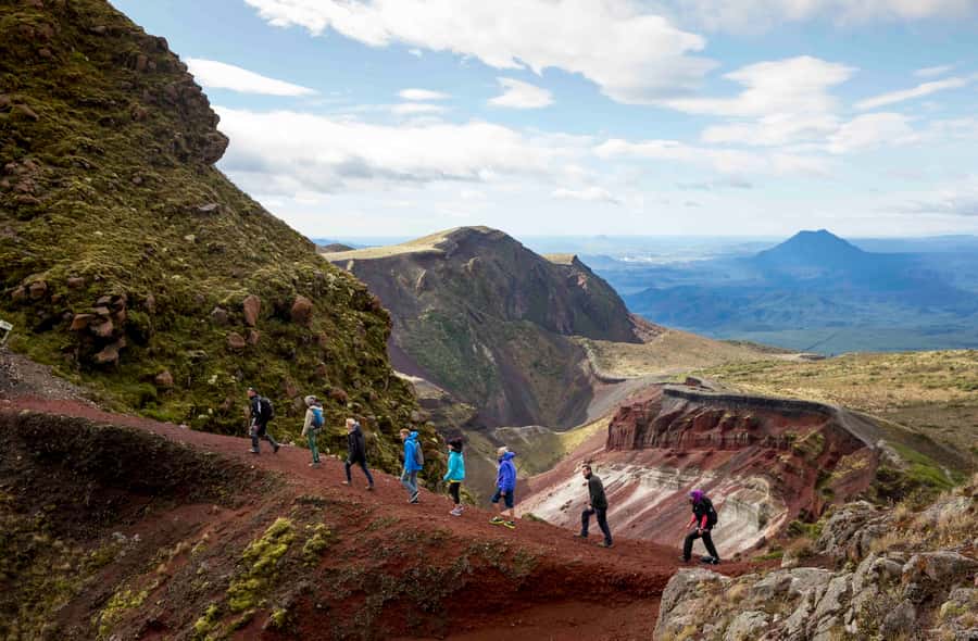 Rotorua: Kaituna Rafting & Mt. Tarawera Guided Hike Combo - The long day begins with central Rotorua pickup