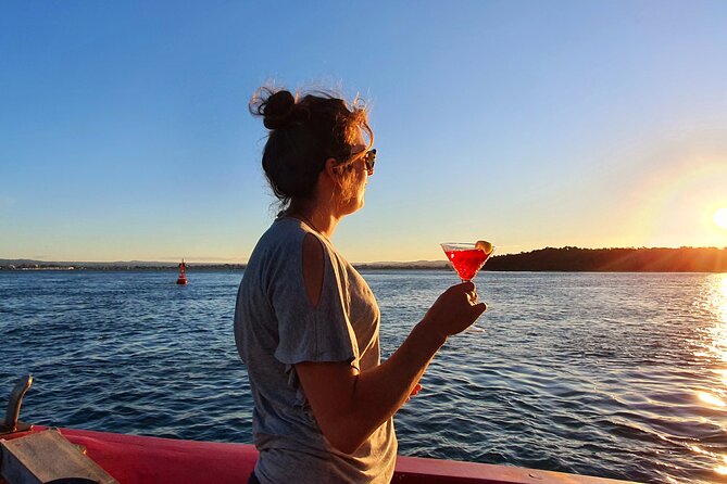 Tauranga Harbour Scenic One Hour Historical Boat Cruise - The boat, seating, and onboard bar