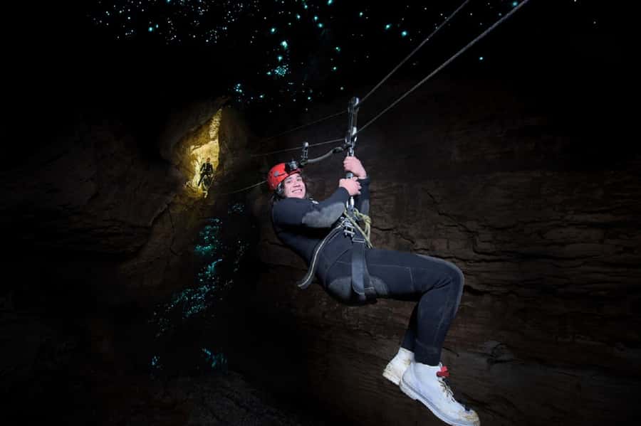 Waitomo Caves Black Abyss Ultimate Caving Experience - Waterfalls, narrow passages, and the final push