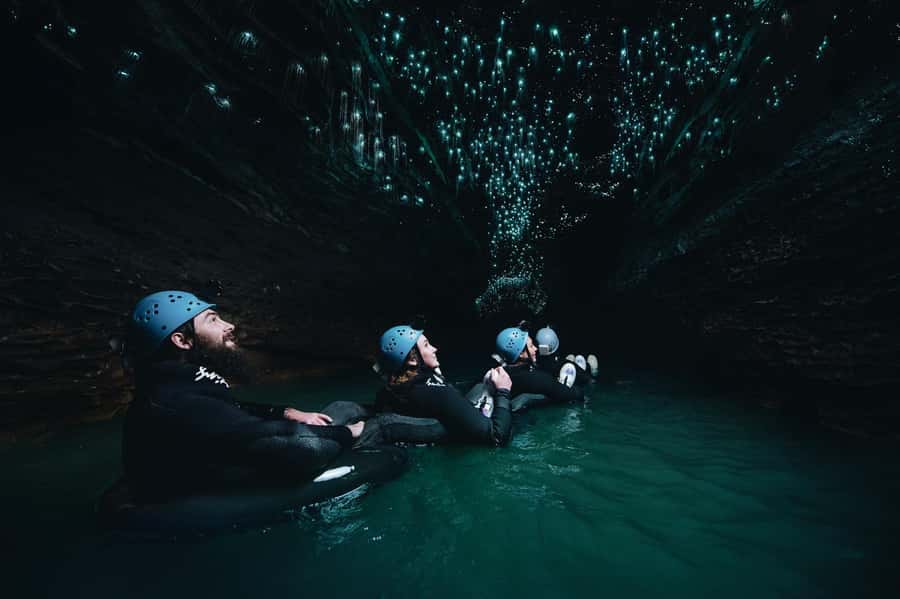 Waitomo Caves: Labyrinth Black Water Rafting Experience - Waterfalls, rock slides, and the active middle section