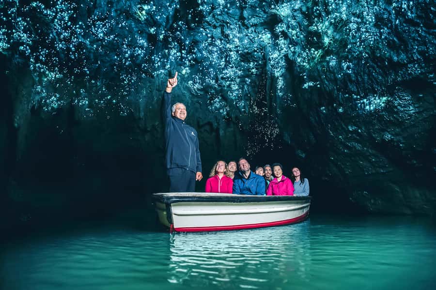 Waitomo: Glowworm Caves Guided Tour by Boat - Boarding the boat beneath the Glowworm Grotto